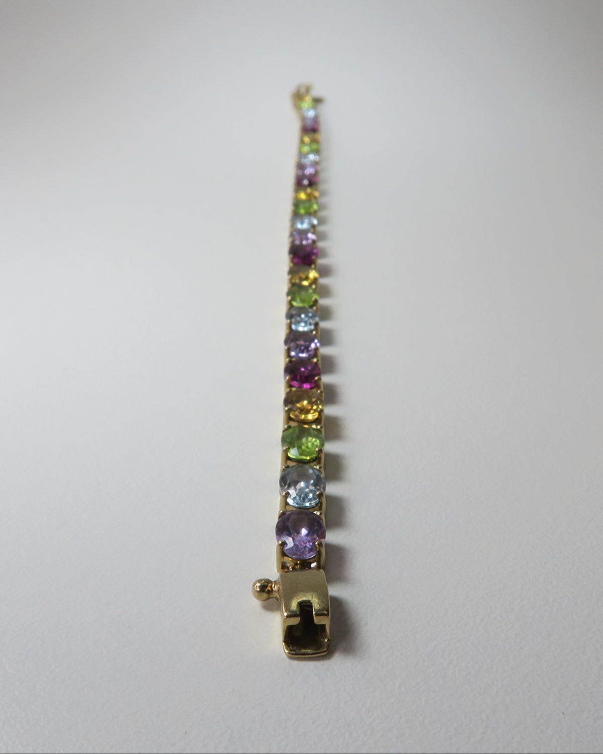 9CT GOLD MULTI‑GEMSTONE BRACELET