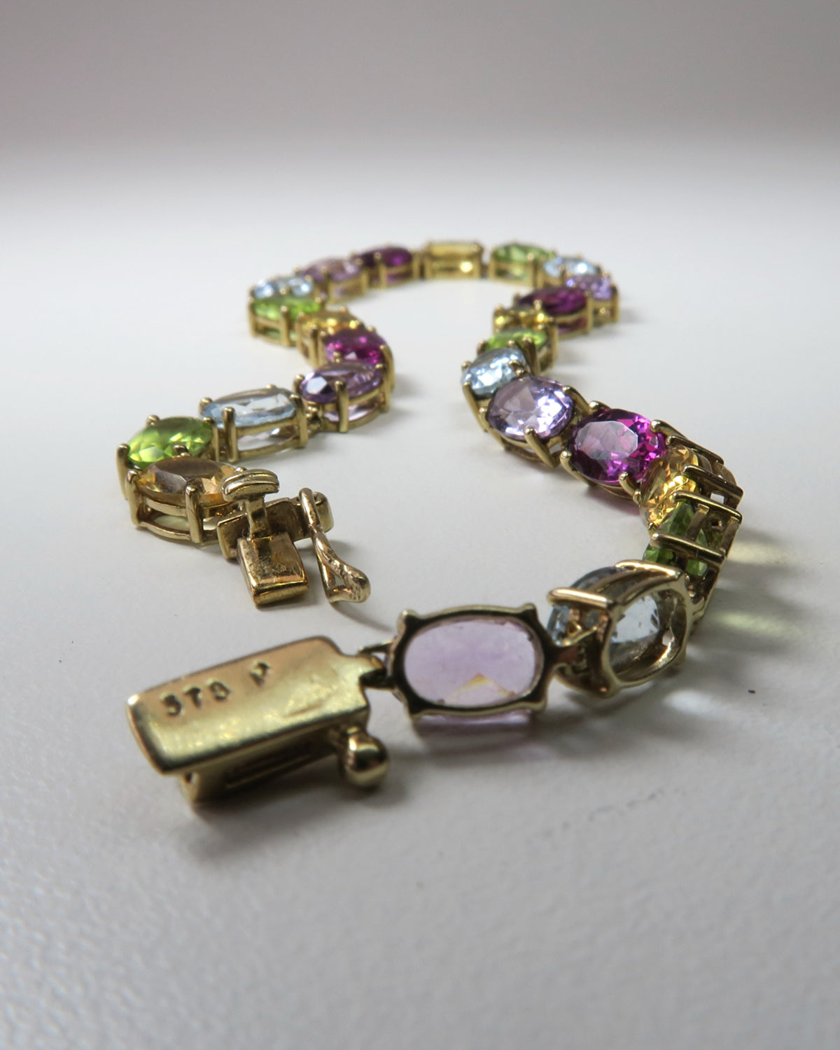 9CT GOLD MULTI‑GEMSTONE BRACELET